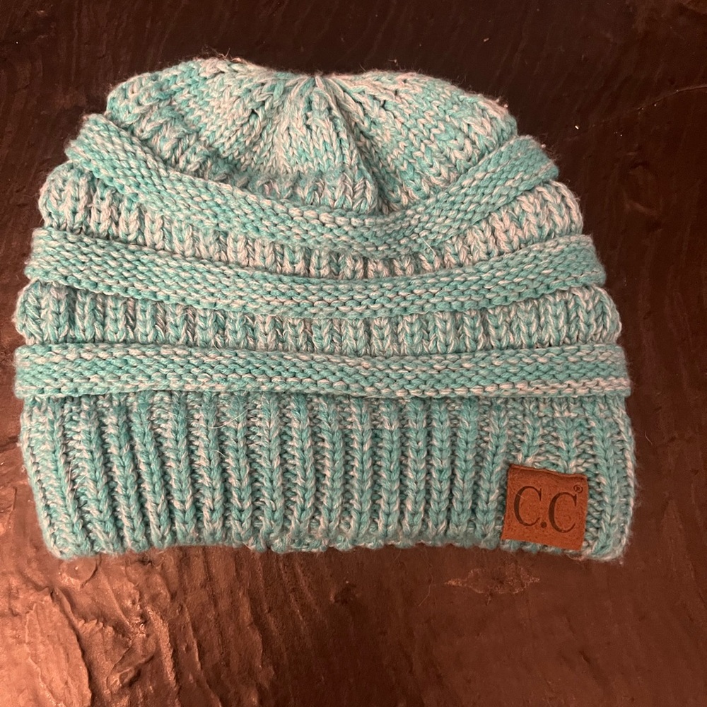 light blue C.C. beanie